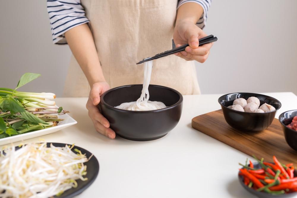 Pho noodle is white, soft yet resilient, able to absorb hot broth